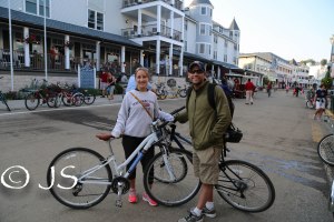 Brad and I with our bikes downtown Mackinac Island 